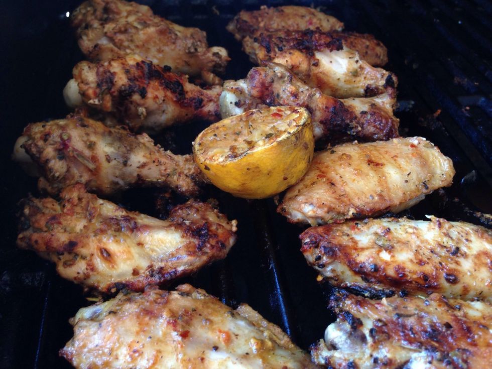 Once cooked, let the chicken cool down. Add some more lemon juice by squeezing the grilled lemon