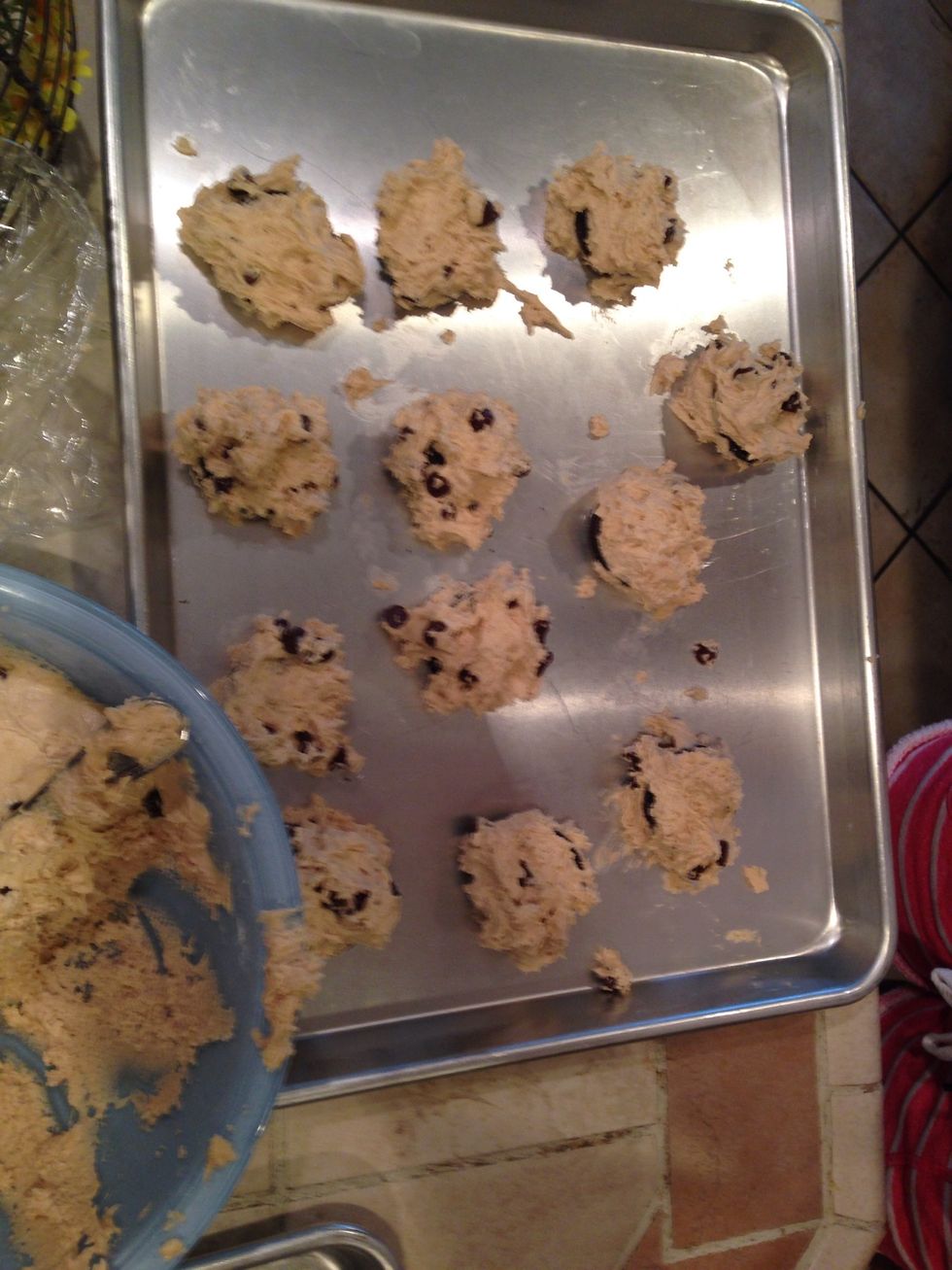 Once cookie sheet is filled, time to put them in the oven!
