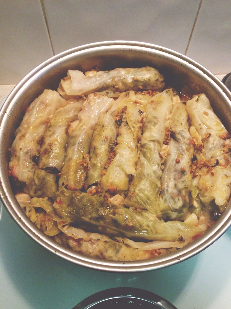 Once cooking time is over, your leaves should look like this. Test one roll to make sure cabbage leaf is cooked through, and rice is nice and soft.