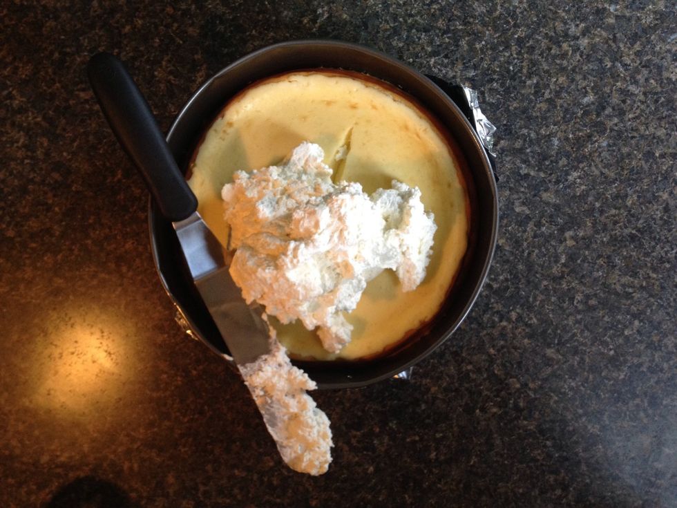 Once cooled down, add the mousse and smooth over the top of the cake.