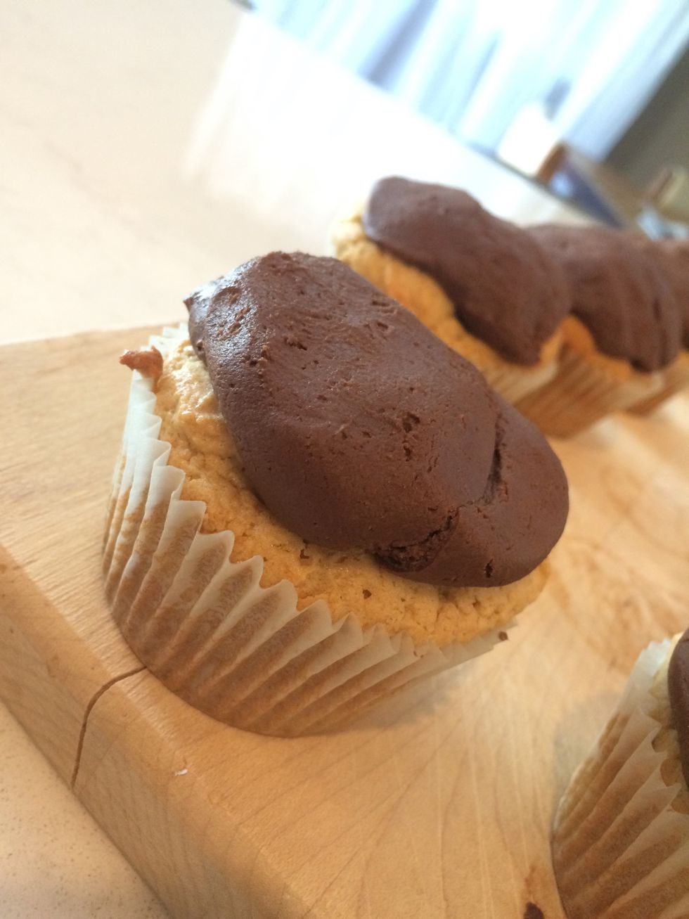 Once cooled, ice the cupcakes. I only iced about 3/4 of them because I wanted some variety!