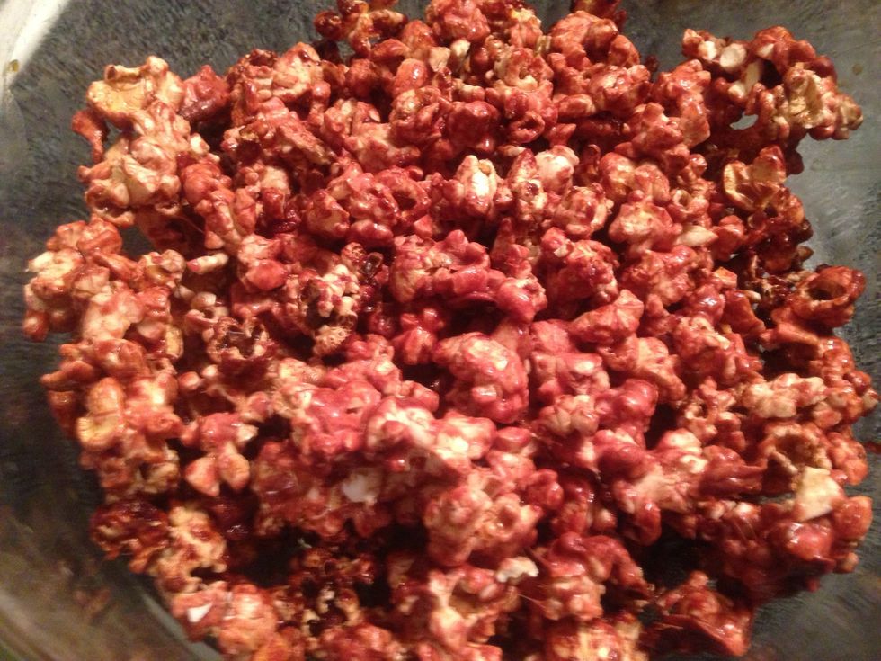 Once cooled, place popcorn in a bowl. Its now ready to enjoy. The finished product is popcorn with a mixture of a slight chocolate and mild peppermint taste.