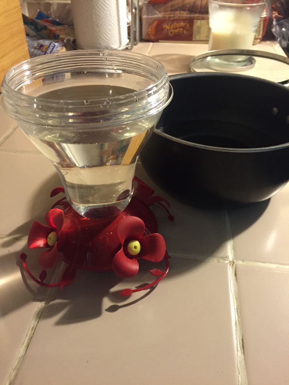 Once cooled, pour into hummingbird feeder and enjoy your visitors! Store extra nectar in an airtight container and refrigerate. Change at least once a week.