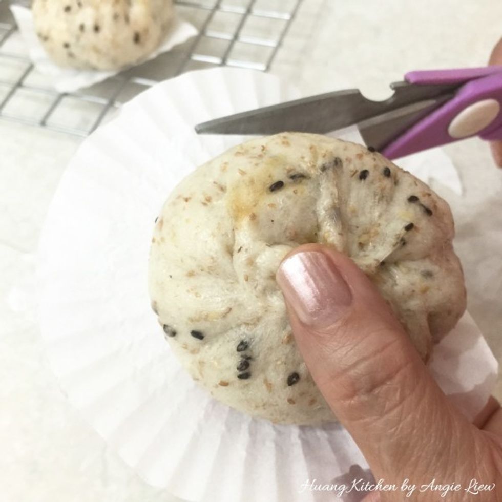 Once cooled, trim the edges of baking liners on the buns, if required.