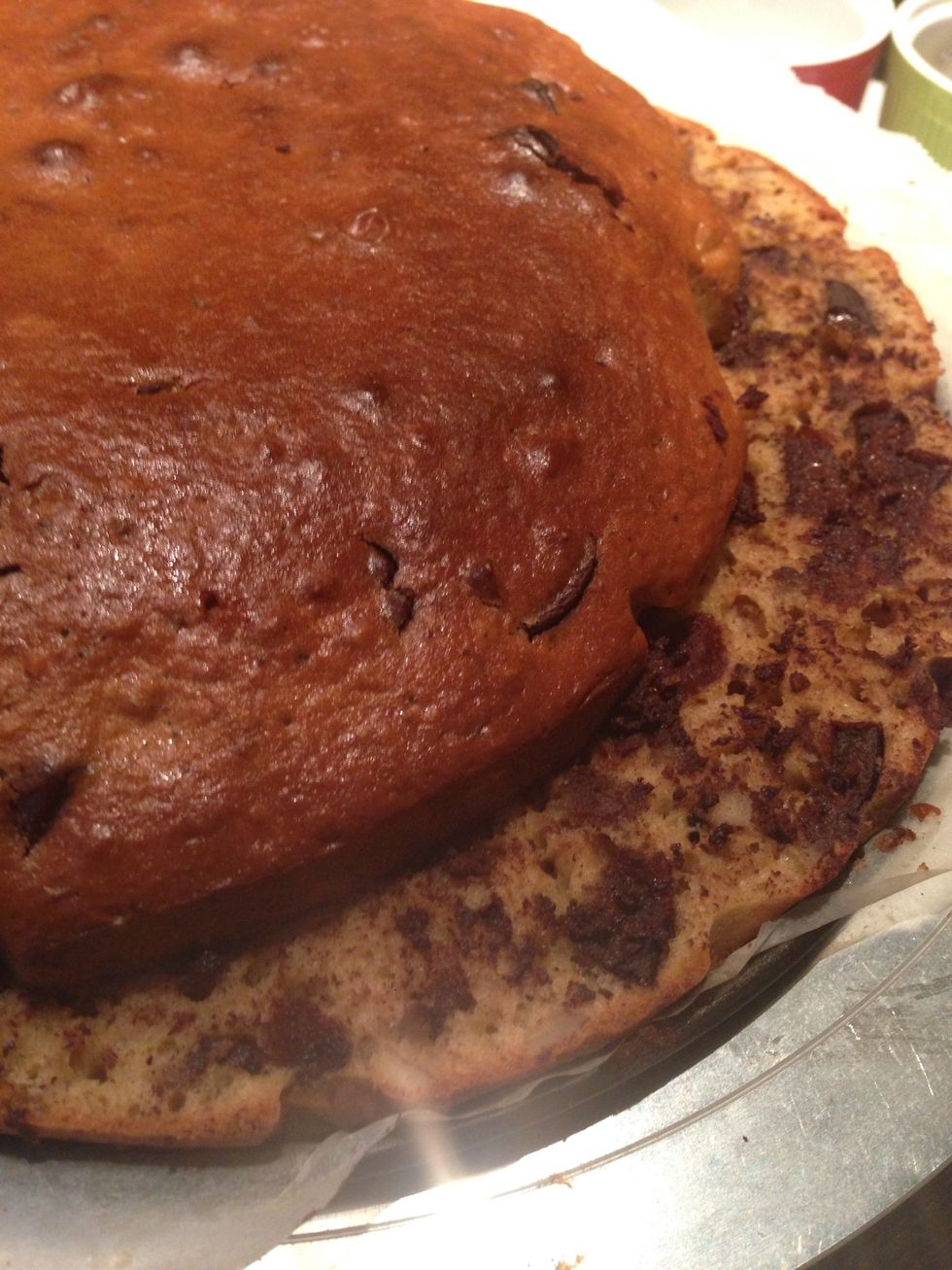 Once cooled, use a long knife & run it around the middle of the cake, scoring & turning until the 2 lines join up. Carefully start turning & cutting your cake going deeper each time like this picture.