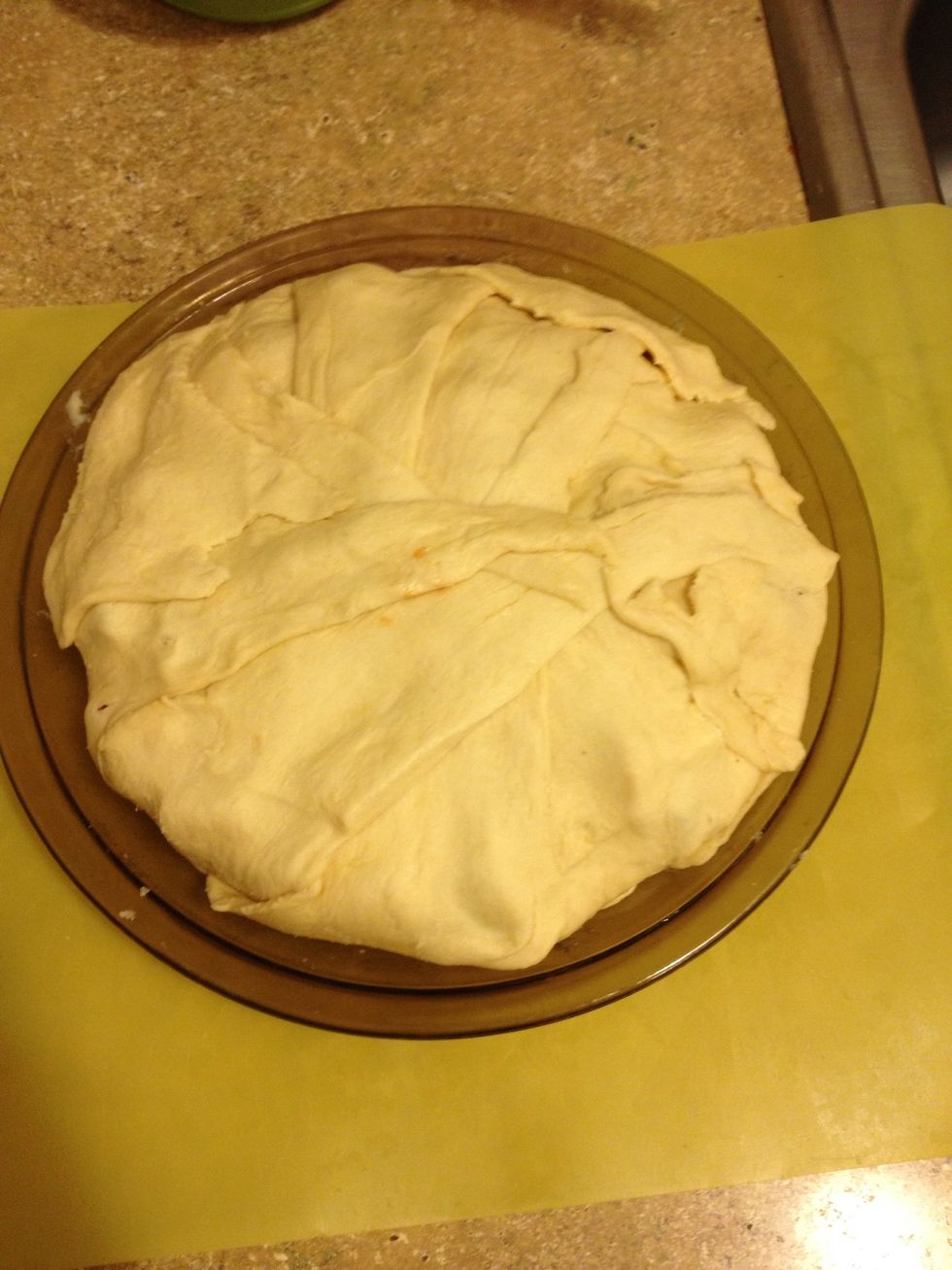 Once covered place in oven about thirty min or so until crust is golden brown