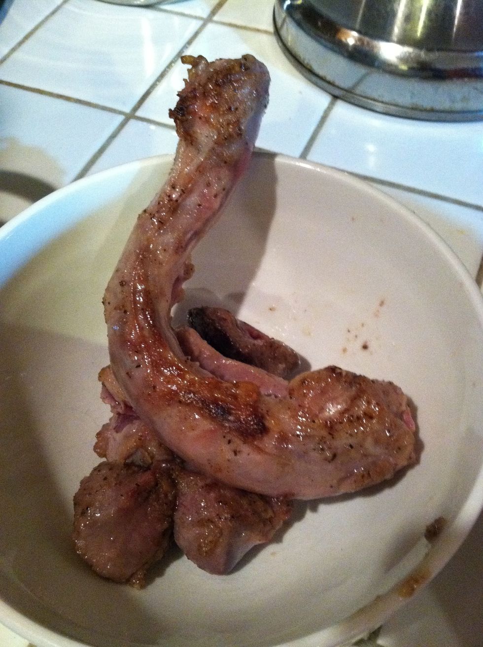 Once done cooking remove the neck and giblets and set them aside for later. Drain the oil from the pot but do not clean.