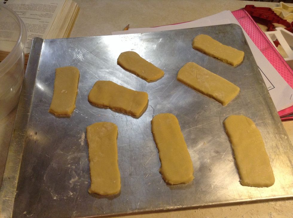 Once done with the dough cut them into oval shapes which indicates minions.