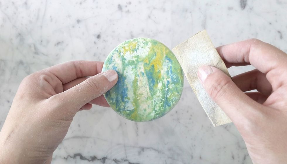 Once dried, give the coasters a quick sand to smooth over any rough edges.
