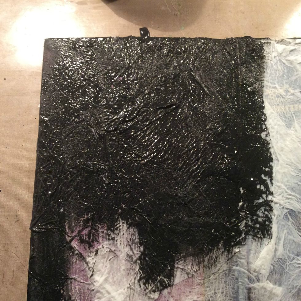 Once dried, paint with a coat of black gesso for a mat finish. You can also use acrylic but this gives more of a shiny finish.