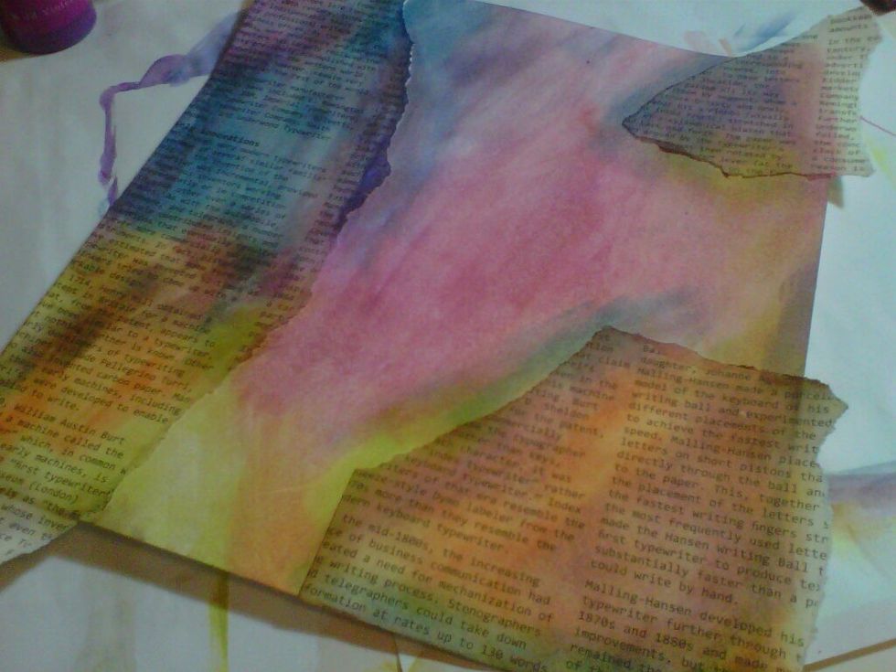 Once dry, pick out inks (I used Tim Holtz distress inks) and go over the paper highlighting areas until happy