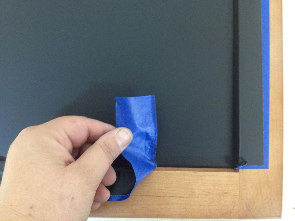 Once dry, remove the tape from the outside first. Pull the innermost strips of tape upwards, towards the panel.