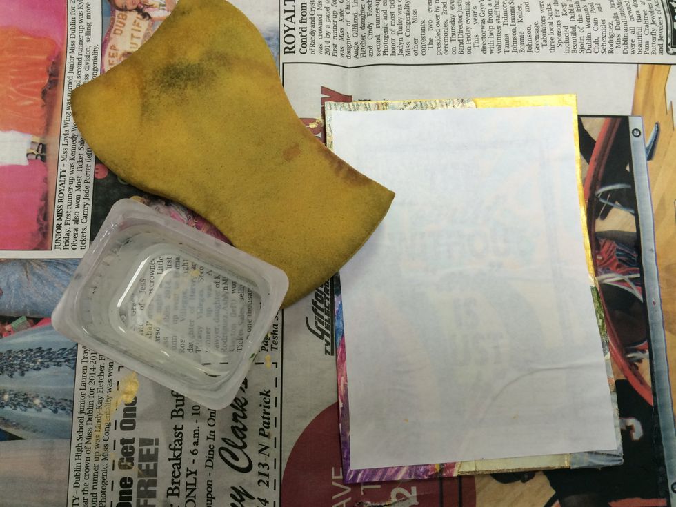 Once dry, use a damp sponge to dampen the paper.