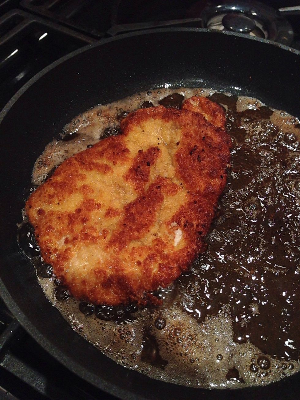 Once each loin is cooked, put on kitchen paper and allow some if the excess oil to drain. The loins can be kept warm in an oven until all are cooked