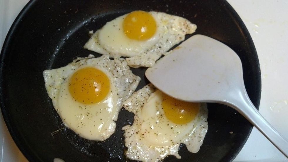 Once eggs are cooked through (not slimy anymore) separate them .