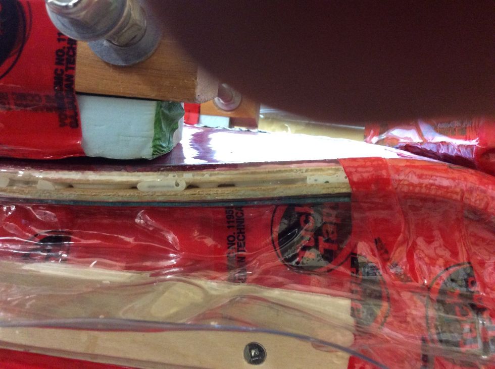 Once everything is finished being clamped. Check the sides of the board to check for glue coming through the sides of the board, that's how you know that you have done it right.