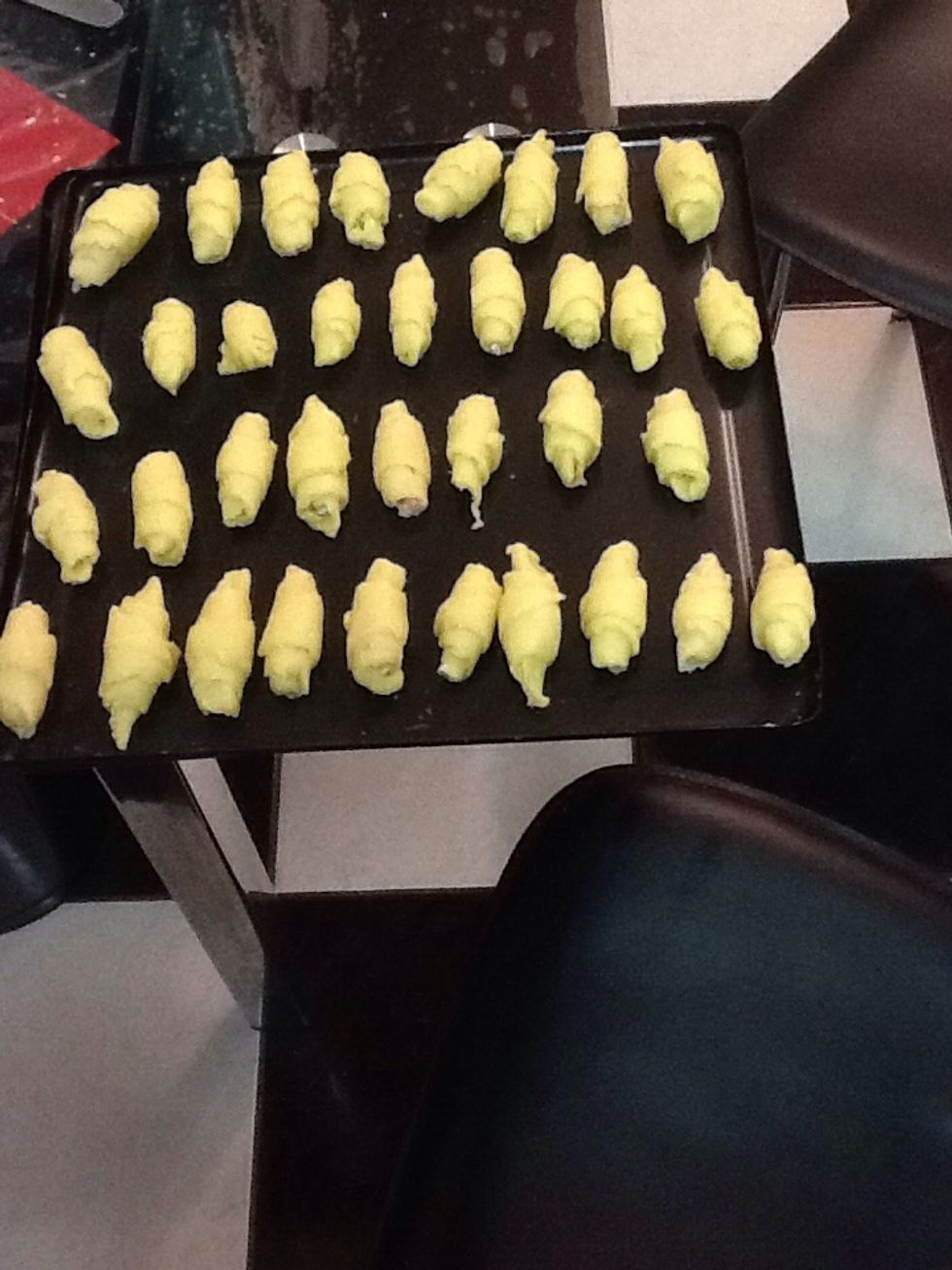 Once finished rolling all the Turkish delight , place them on a baking tray and put it into the oven