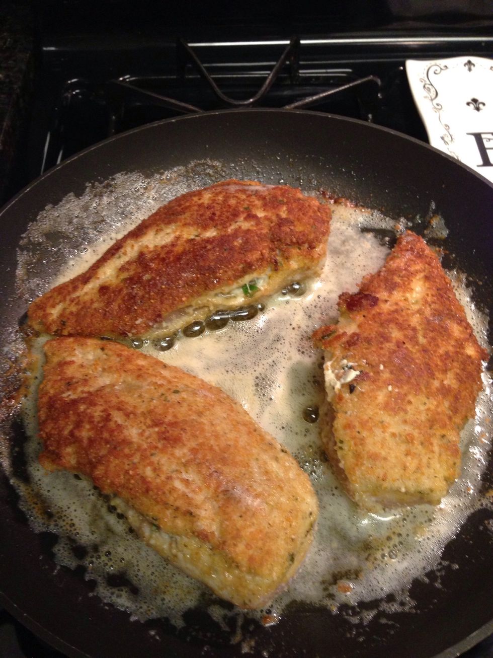 Once golden brown on each side, finish cooking off chicken in the oven for 10-15 minutes.