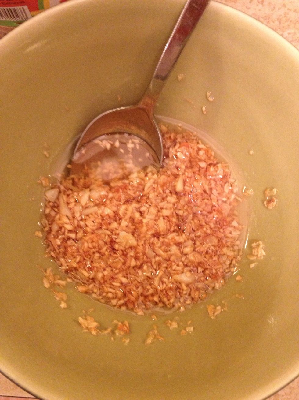 Once golden brown, turn off heat and pour the fried garlic with oil in a ceramic bowl. Taste them! They are delicious :)