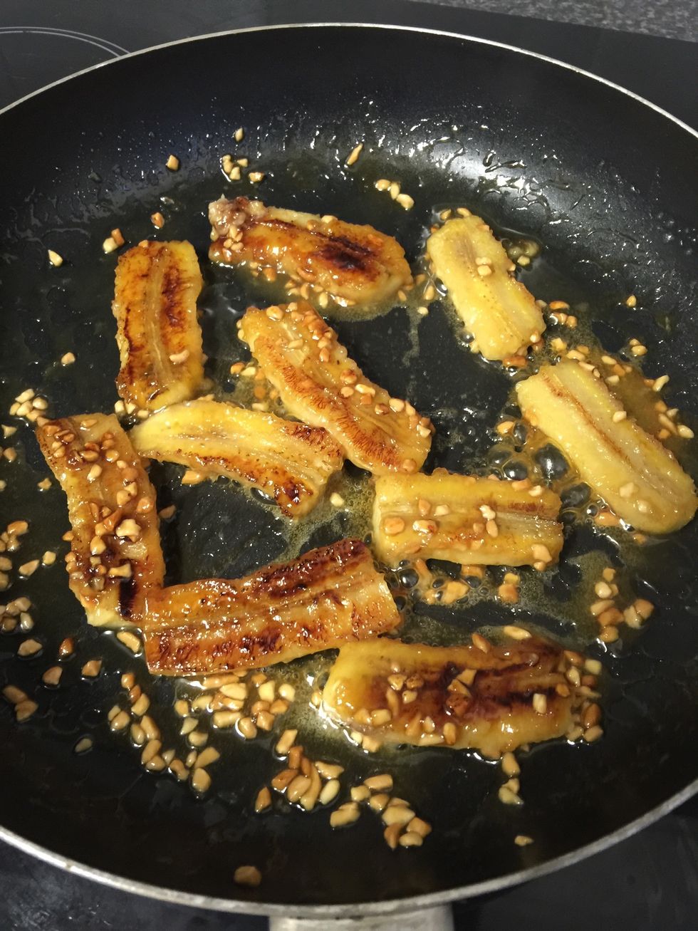 Once he bananas start to turn golden flip over the bananas and continue to cook for 5 mins or so until starting to soften.