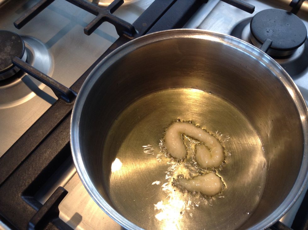 Once hot, add the garlic.