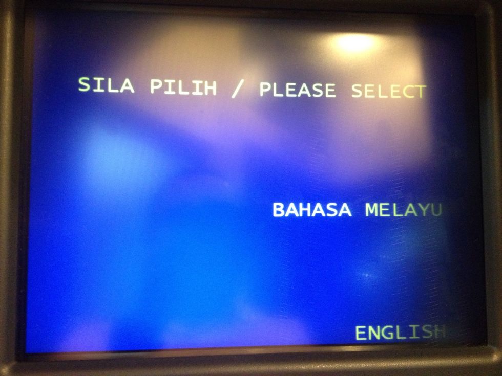 Once in front of the machine, click any of the buttons and this screen will appear. Choose your language