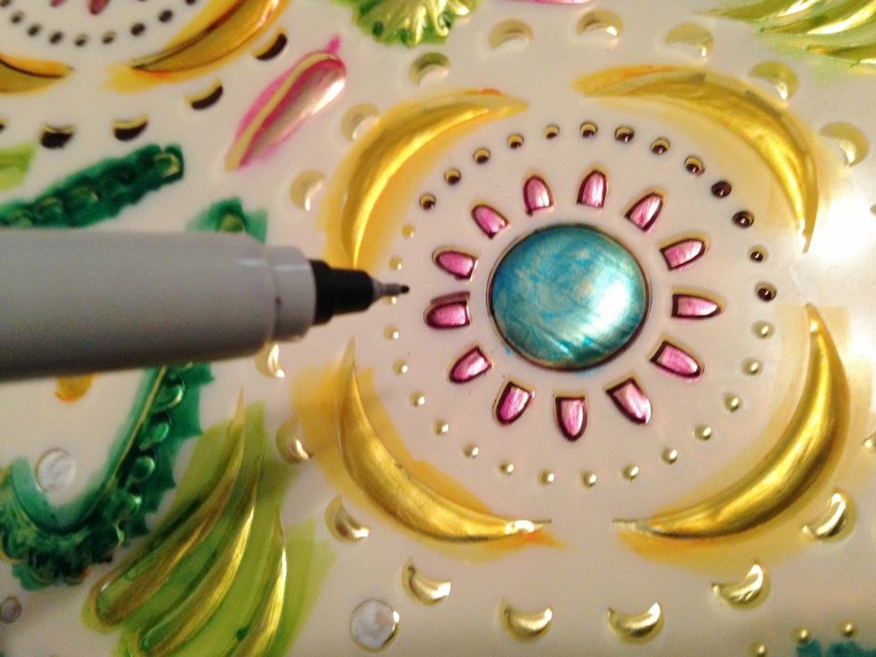 once inks dry, outline designs using fine tip Sharpie - with stencil still in place as a guide. also ink any tiny dotted areas.