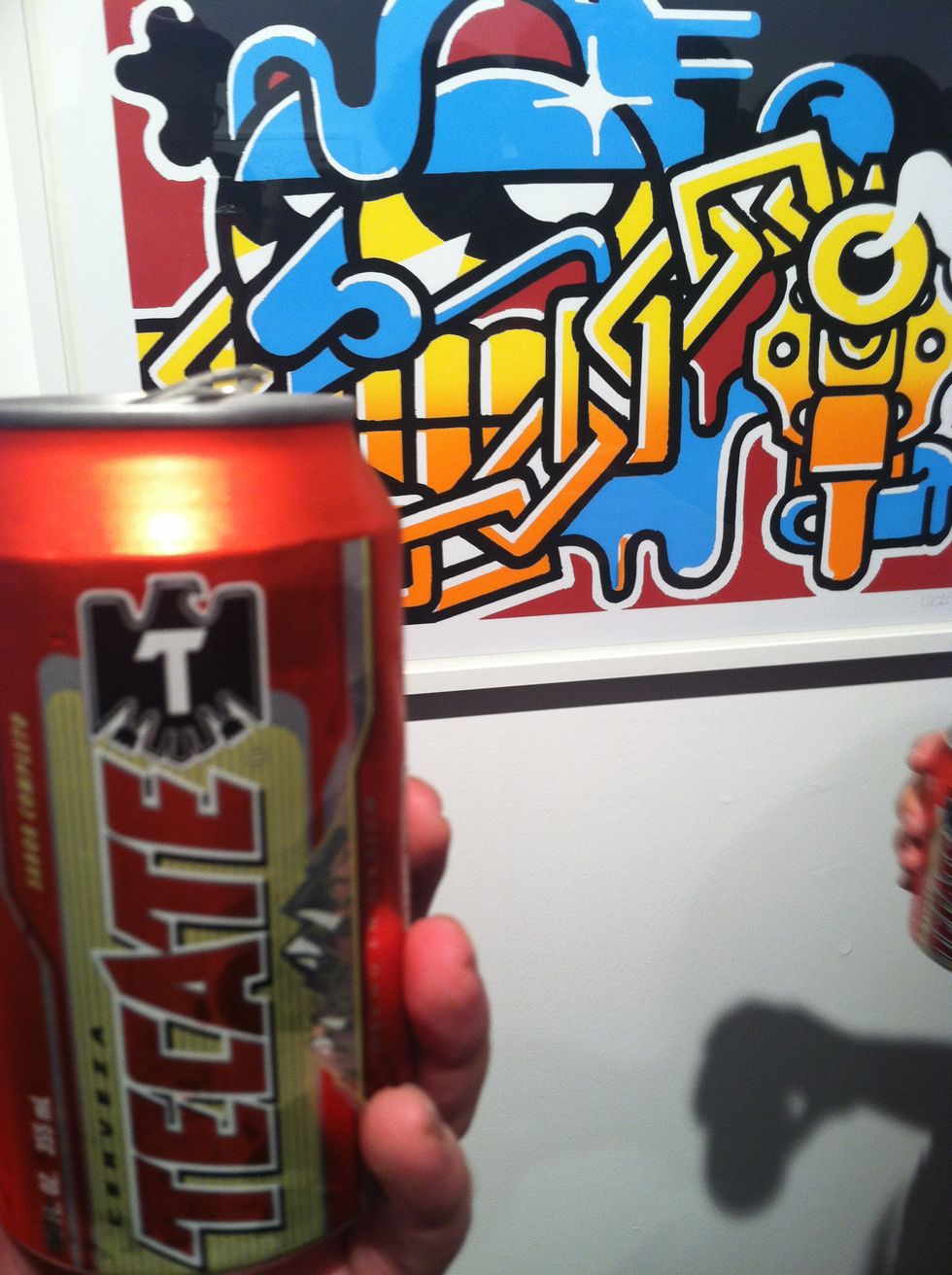 Once inside, get a cheap beer and drink it. This is typically free.