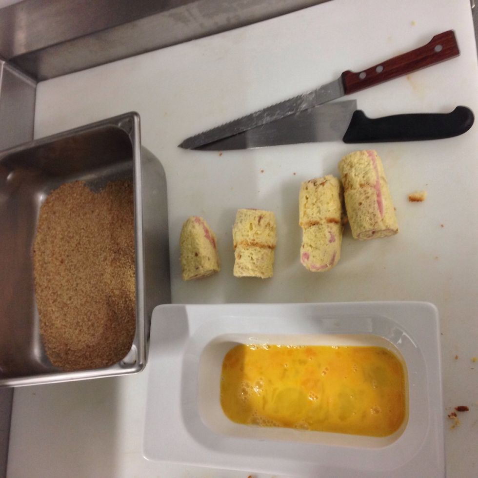 Once is cut pass it down in egg and after that the bread crumbs