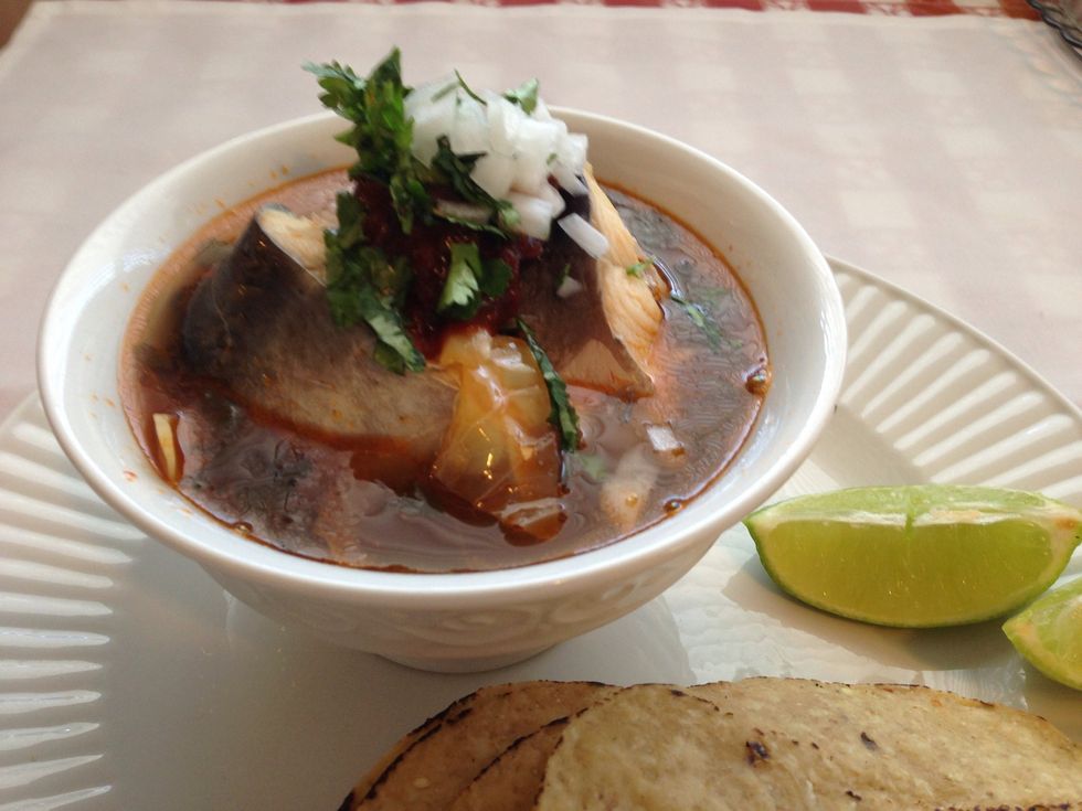 Once is ready to serve garnish with chile chipotle and onions and cilantro and lime wedges...