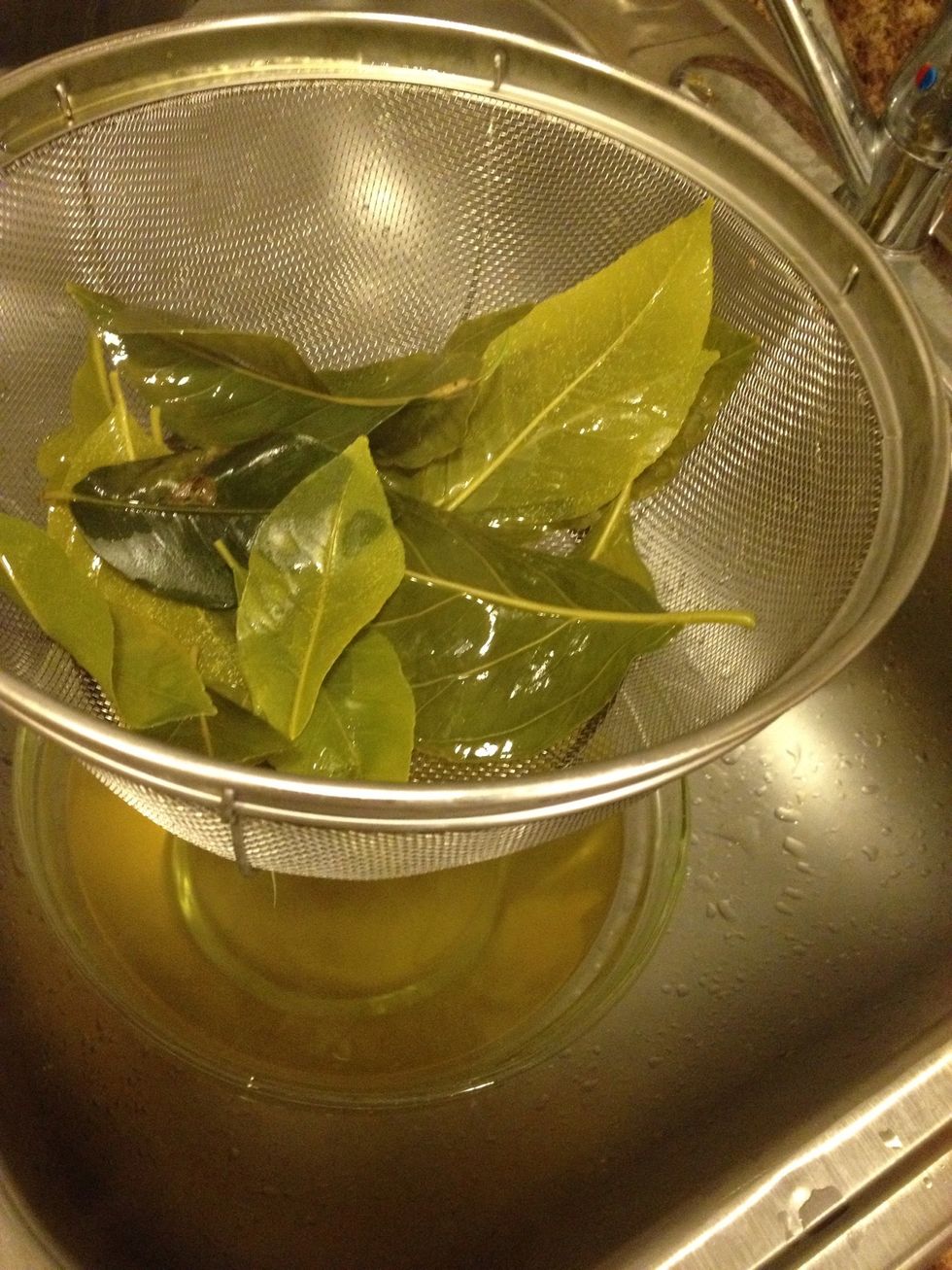 Once it has cooled off, strain out the leaves