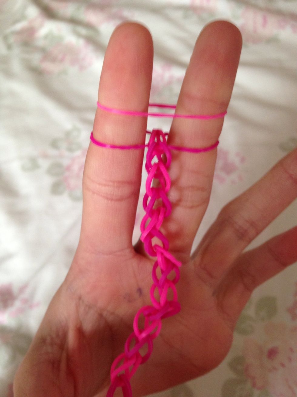 Once it is at your desired length, add one more band...