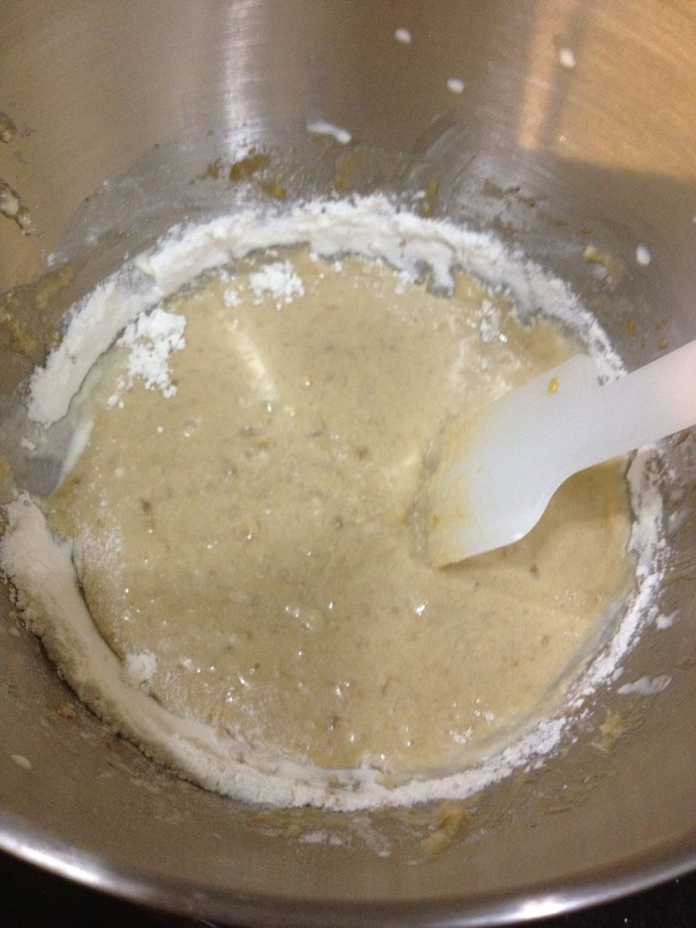 Once it looks like this, remove it from the stand mixer. We must not overmix it! So when it gets to this stage, simple whisk in the unmixed flour until incorporated, by hand.