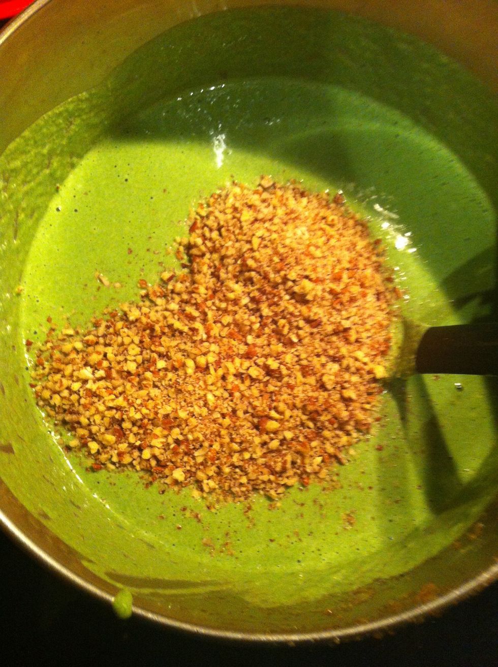 Once it's blended add the grinned pecans and stir it