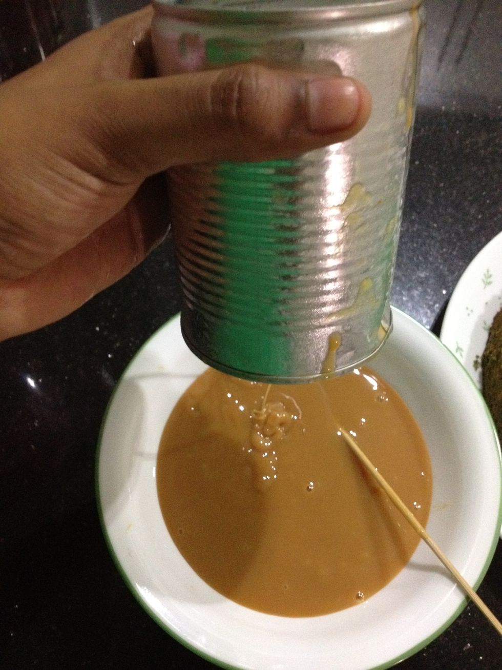 Once it's done let it cool down completely before opening it. I lead a sad life because my can opener broke 3 months ago and I haven't bought a new one. I poked a hole with a knife. Hence, the skewer.