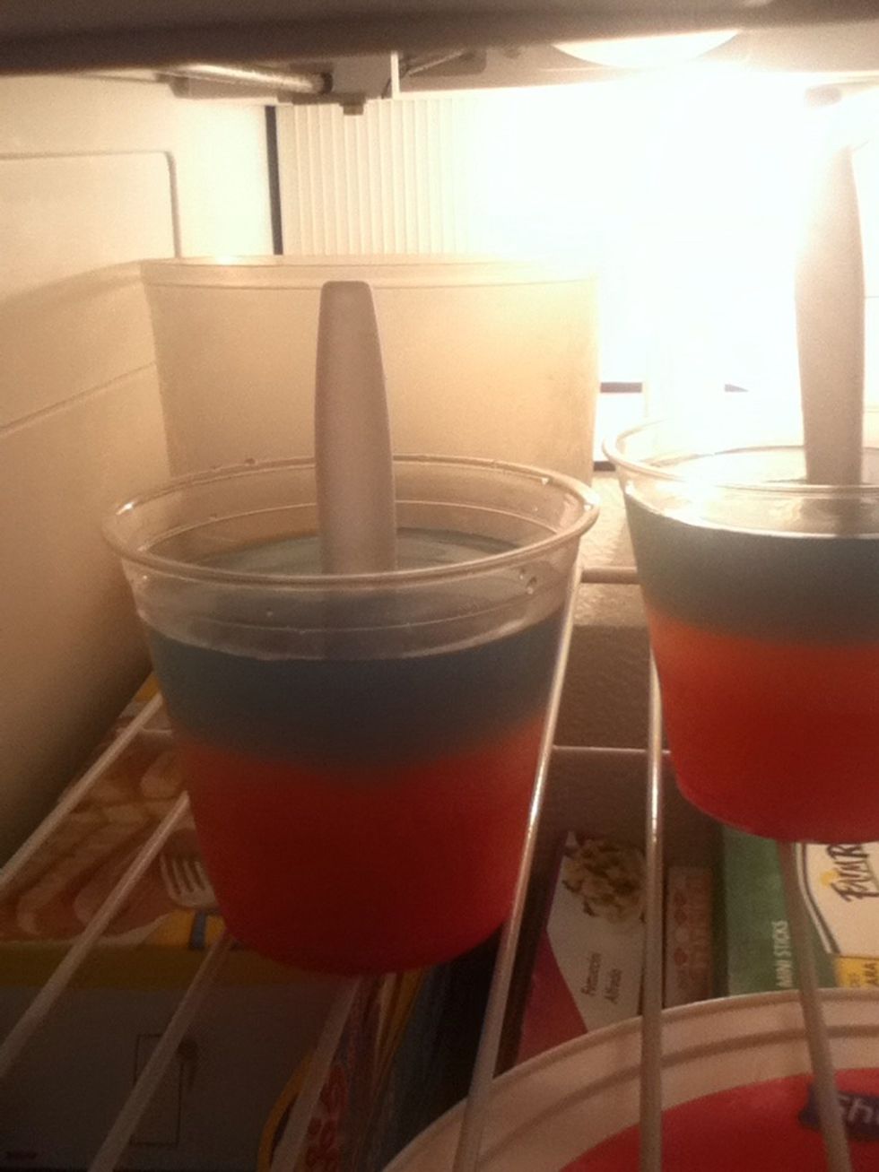 Once it's frozen pour the blue in.