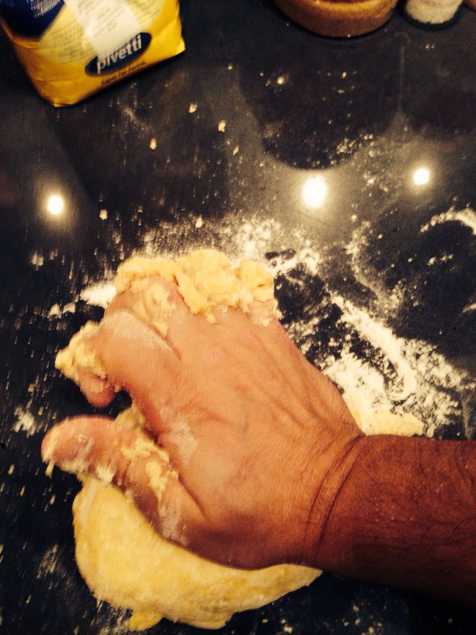 Once it's starts to stick you can move it to the kitchen counter and keep working it. Use the palm of your hand for a stronger grip