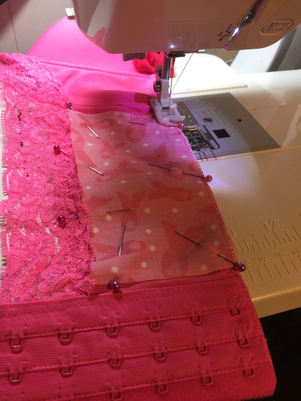 Once items are pinned, go ahead and start sewing items down.