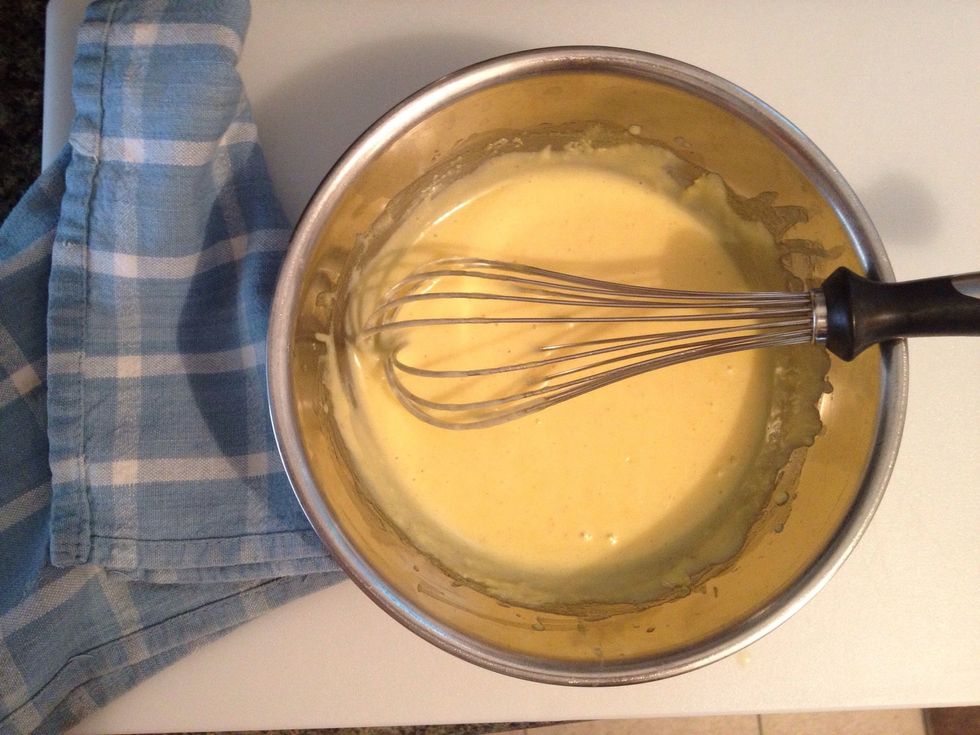 Once mixed...remove from heat but keep whisking! Add the Cheyenne pepper and a splash of the boiling water. This will thin the mix as well as give it the lovely yellow color.