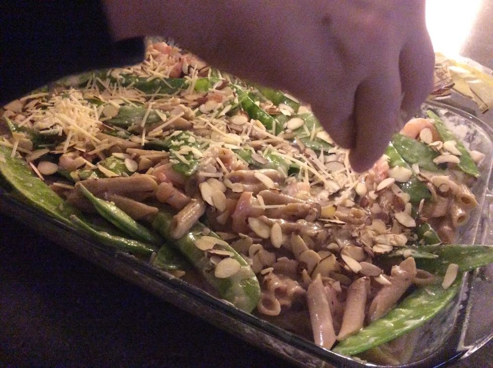 Once mixed sprinkle parmesan and sliced almonds
