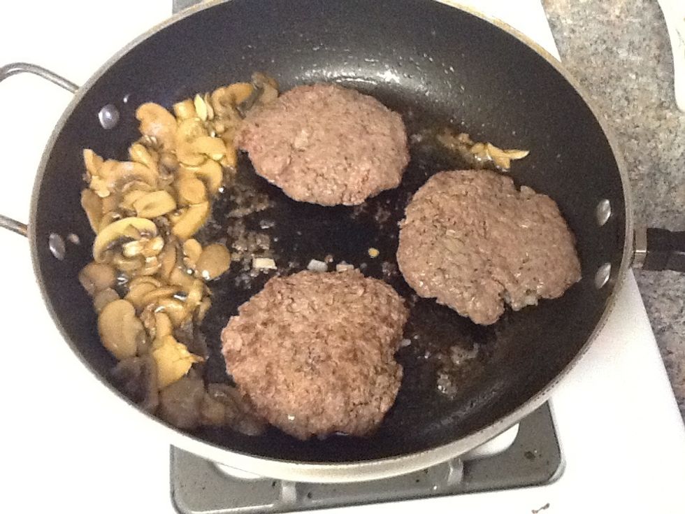 Once mushrooms are brown, return patties to the pan.
