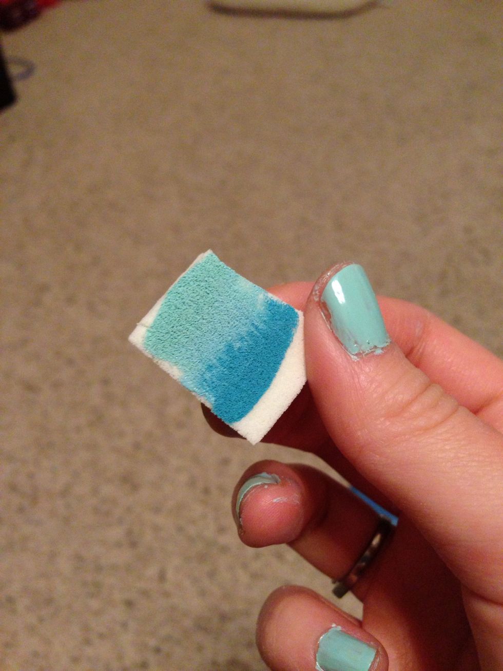 Once nails are dried. Take your makeup sponge (I cut mine to make it smaller and more of the width of my nail) and paint the polishes you have selected on the sponge.