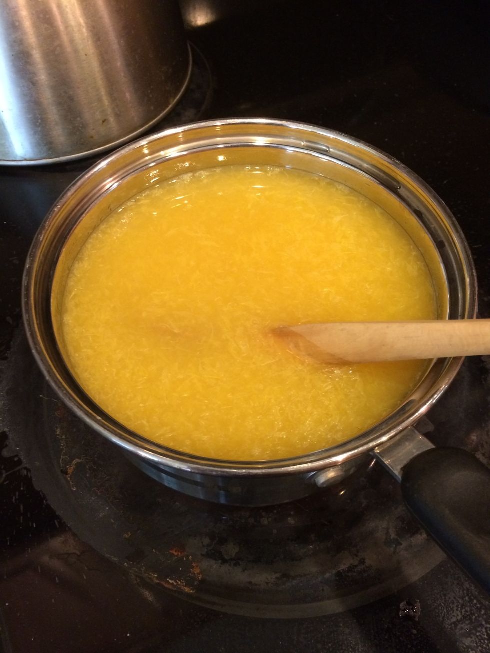 Once near boiling, add the 2 cups of orange juice