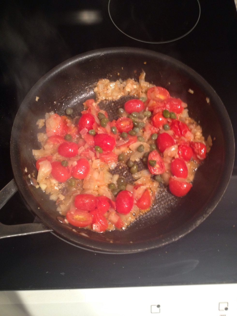 Once onion are golden brown, add capers and white wine and cook for 3 more min