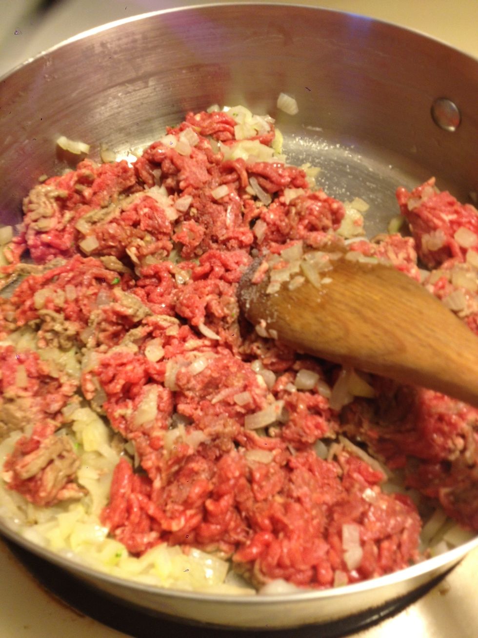 Once onions are translucent, add 1LB of ground beef& a dash of salt to taste. Saut\u00e9 until cooked through.