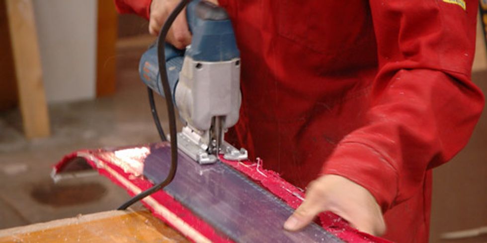 Once out of the press, trim all the excess material off using a saw