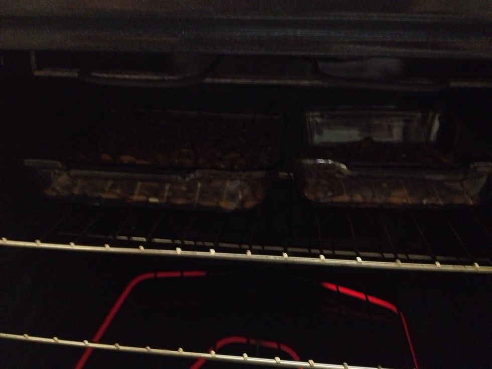 Once oven is preheated slide the baking dishes in!