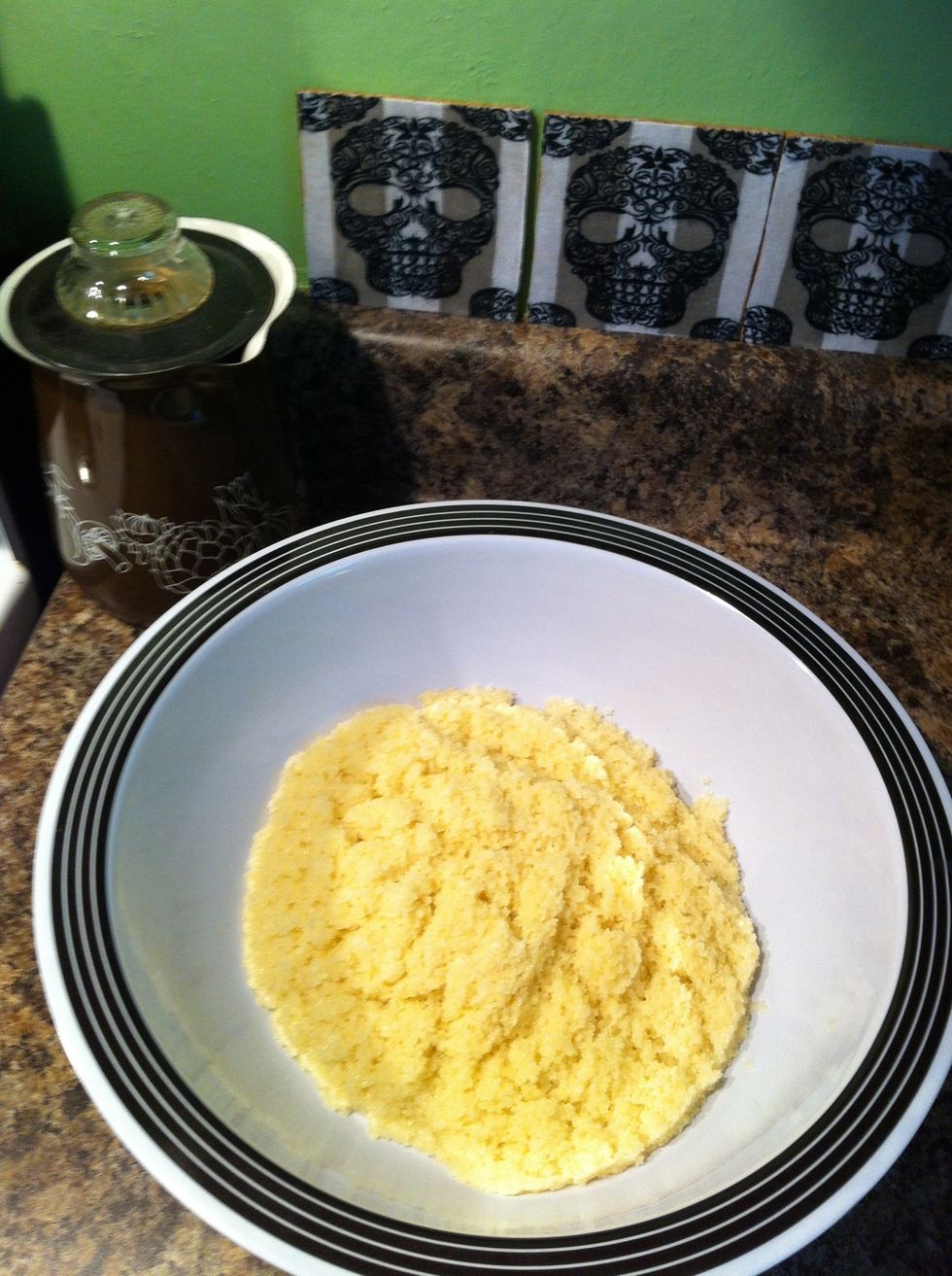 Once pasta is done; strain and put in large bowl. You will need a bowl large enough that the pasta only takes up about half the bowl.