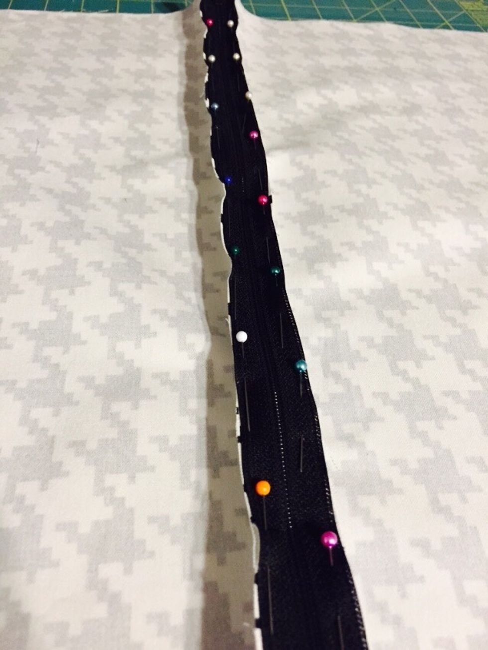 Once pinned flip open and make sure both sides are securely pinned.