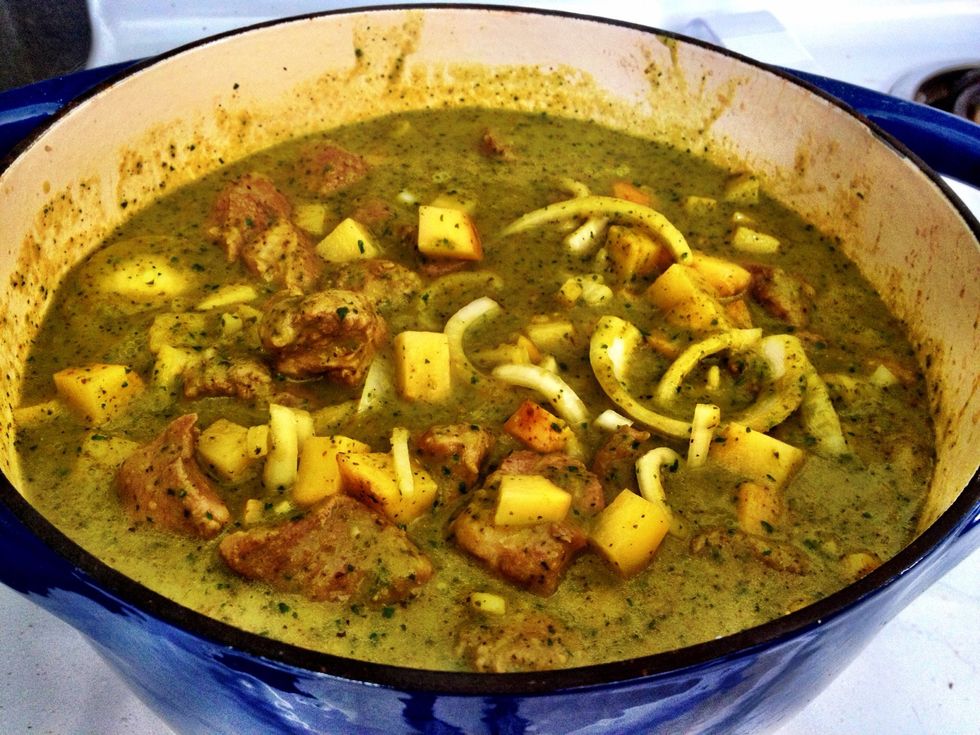 Once pork is browned, add verde sauce, reserved diced potatoes and sliced onions. Add honey and salt to taste. Cover and place into a 250 degree oven for 3 hours or until meat is fork tender.